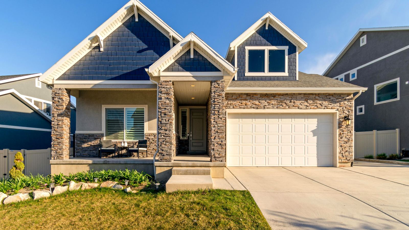Craftsman-style home with a stone facade