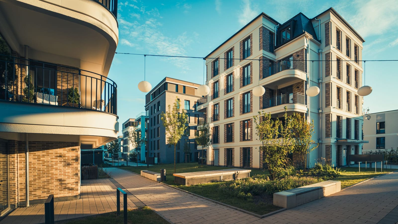 Recent rental buildings with balconies and a landscaped courtyard